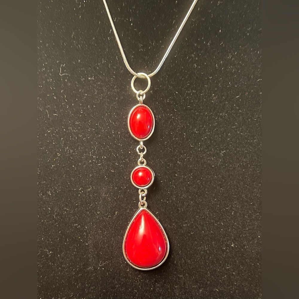 Upcycled jewelry. Beautiful pendant with red stone on silver tone chain